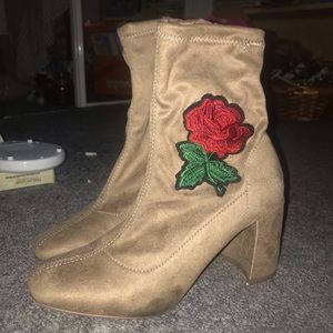 Suede boots with roses....small mark in right shoe